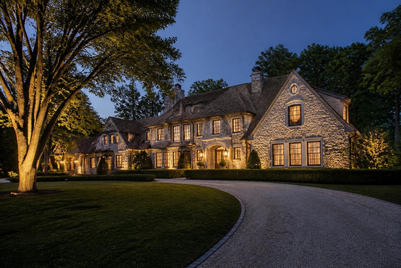 Estate home exterior at dusk