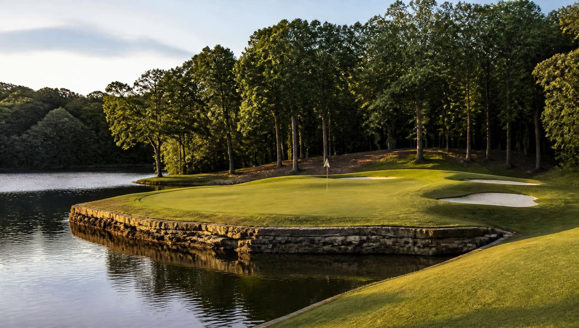 A championship green on Arnold Palmer's TPC Piper Glen course at sunrise